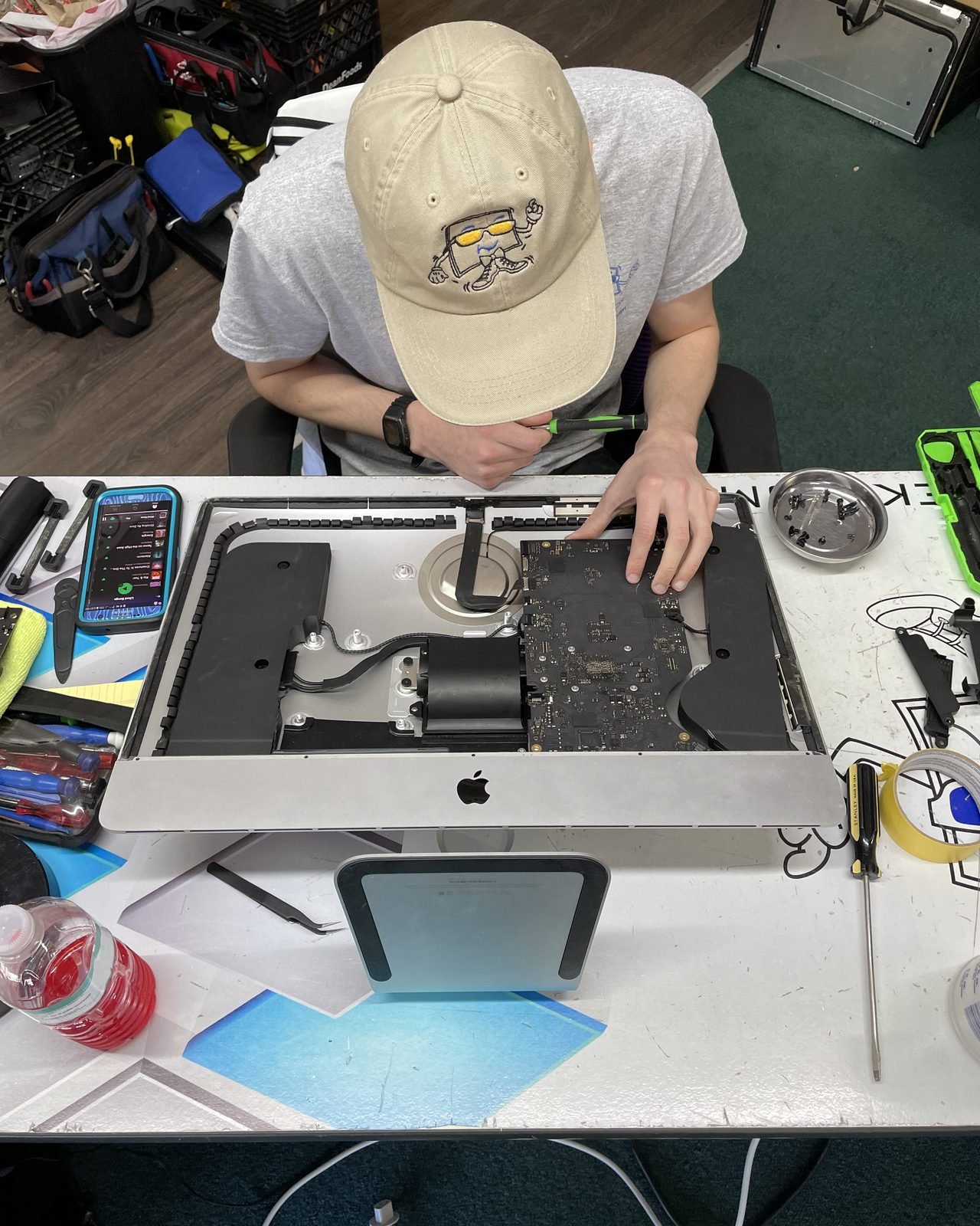 Apple iMac desktop computer on a desk, ready for service at iLuvMyGeek in Dallas, GA
