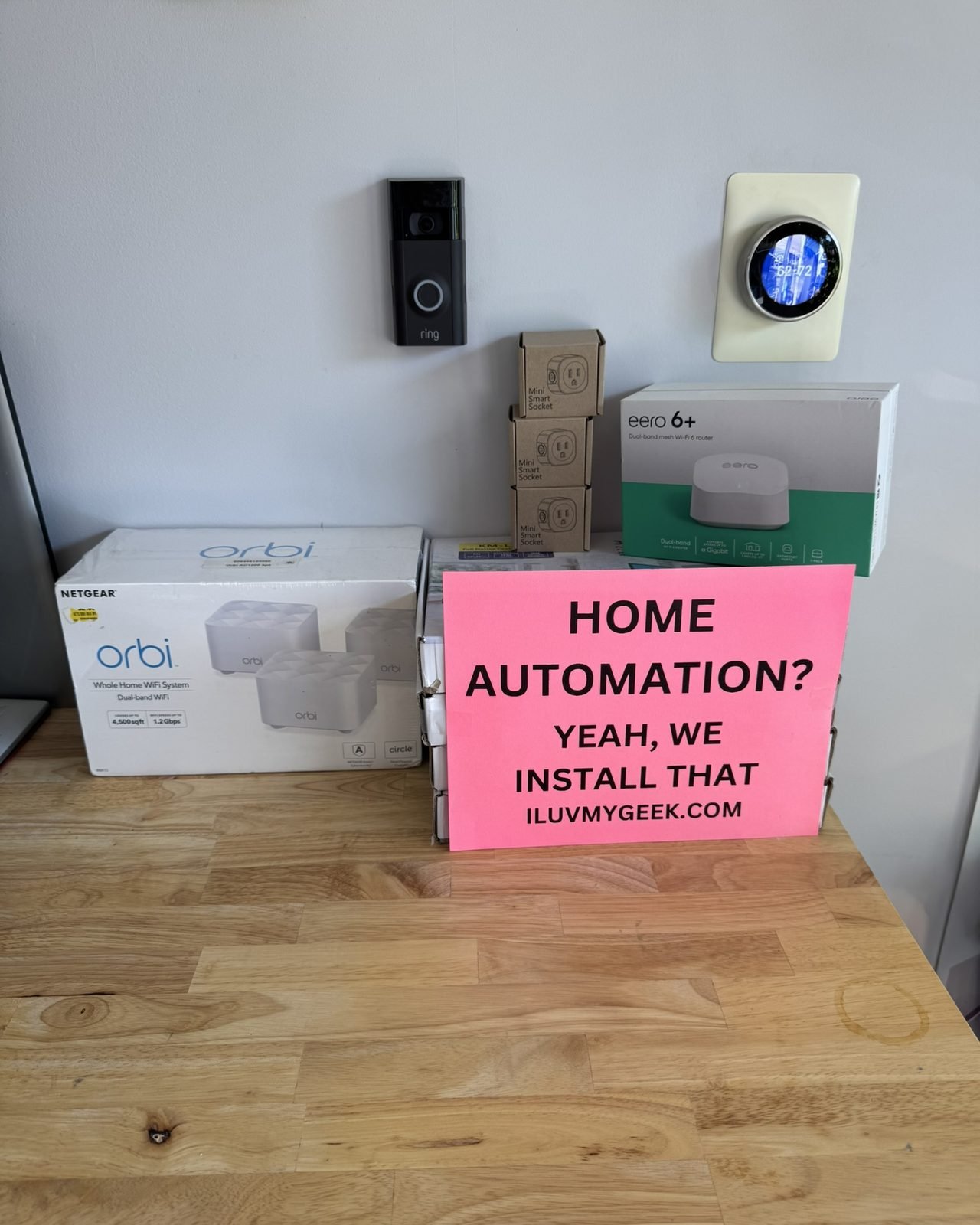Smart home devices iLuvMyGeek installs — Ring doorbell, Nest thermostat, Orbi and eero mesh Wi-Fi, and smart plugs