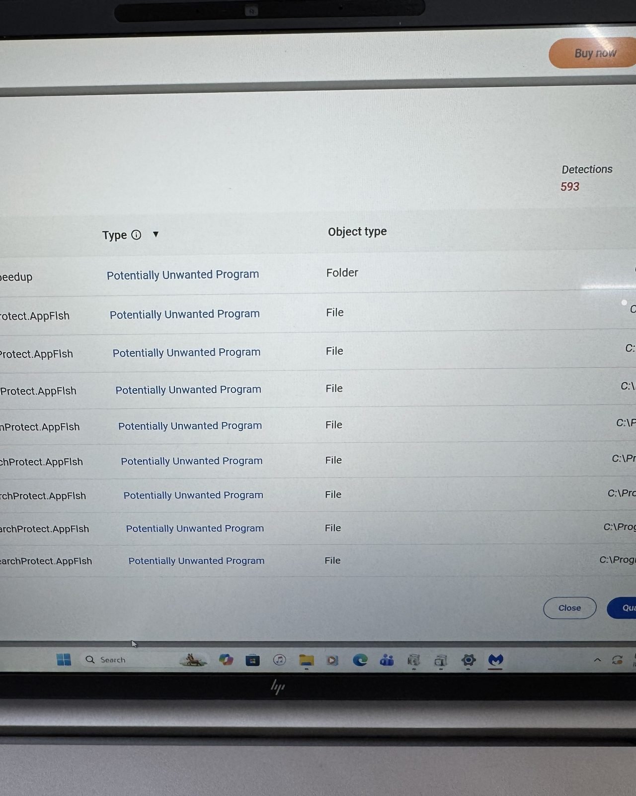 Computer screen showing a malware warning pop-up before iLuvMyGeek virus removal